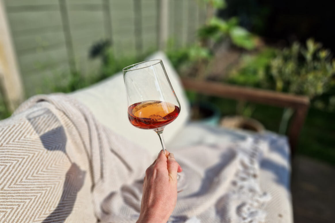 why rose is summer in a glass